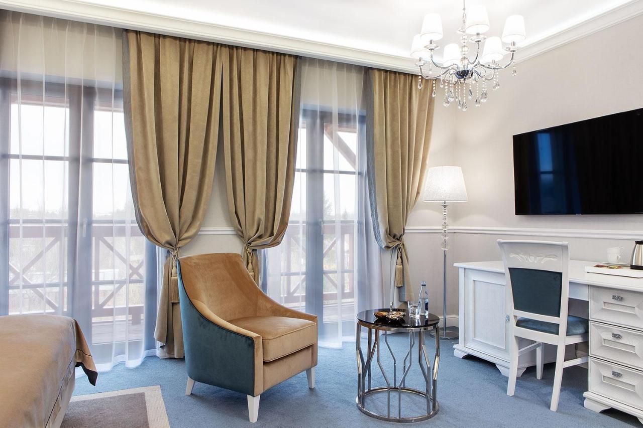 Boutique Odyseja & Spa Ciechocinek Exterior foto A room at the hotel