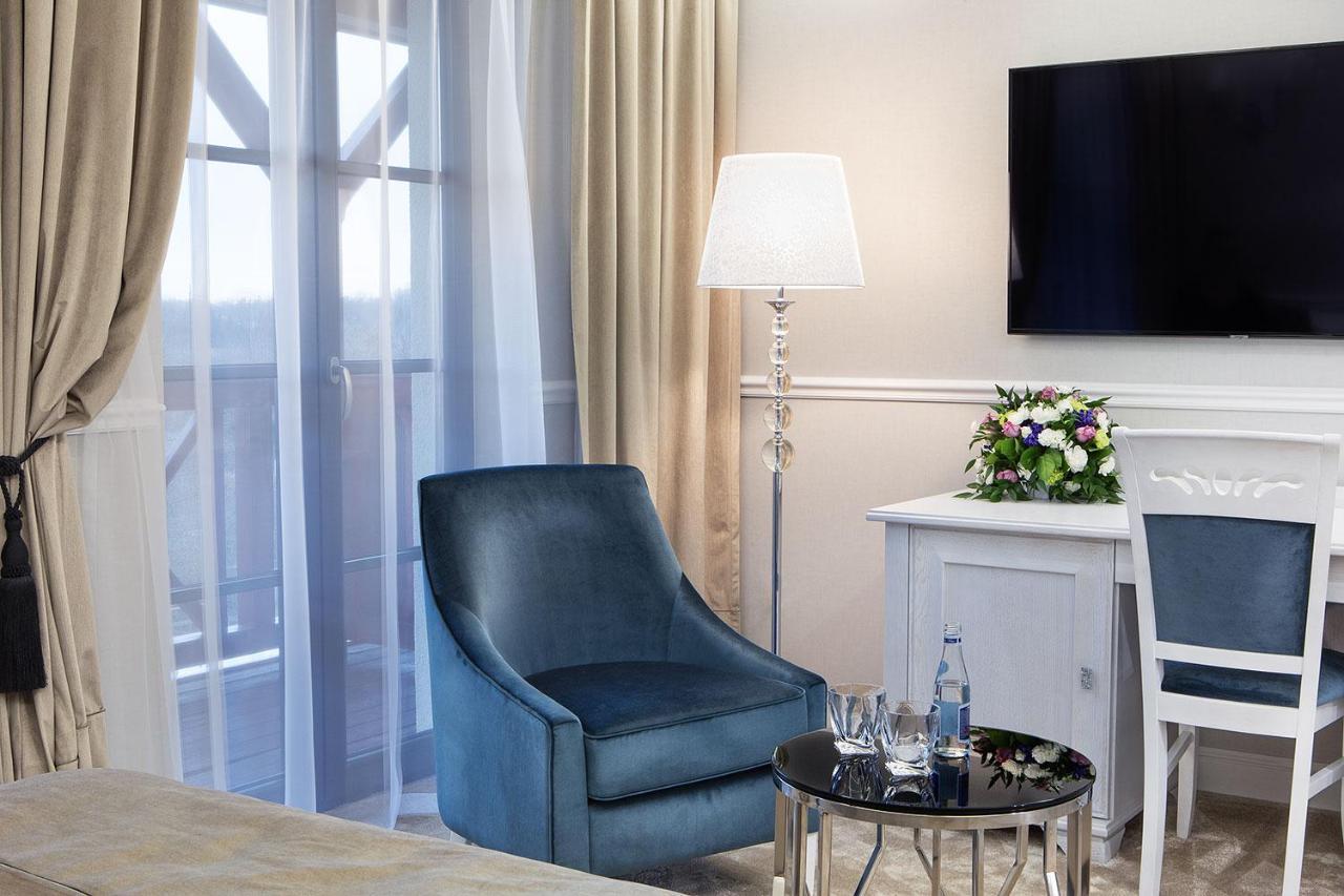 Boutique Odyseja & Spa Ciechocinek Exterior foto A room at the hotel